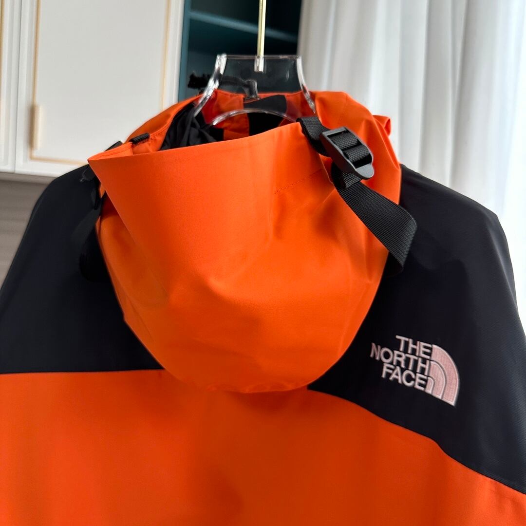 【THE NORTH FACE】マウンテンパーカー オレンジ レディース メンズ 防水 防風 ジャケット オレンジ ブラック ユニセックス 登山 アウトドア ストリート