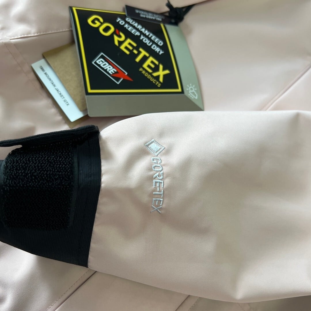 【THE NORTH FACE】マウンテンパーカー ピンク レディース メンズ 防水 防風 ジャケット ベビーピンク ブラック ユニセックス 登山 アウトドア ストリート