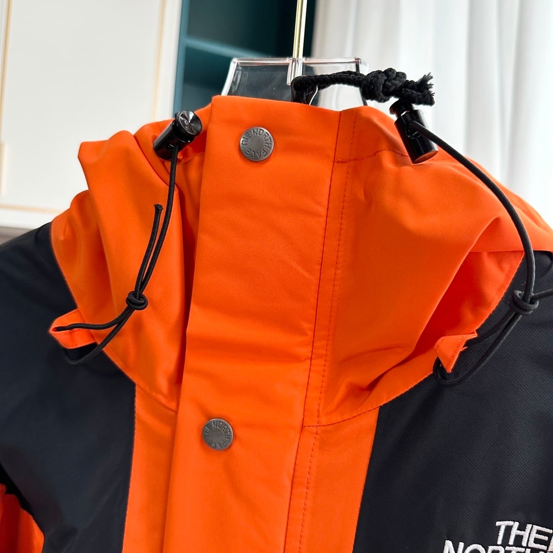 【THE NORTH FACE】マウンテンパーカー オレンジ レディース メンズ 防水 防風 ジャケット オレンジ ブラック ユニセックス 登山 アウトドア ストリート