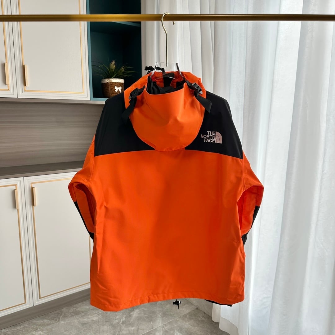 【THE NORTH FACE】マウンテンパーカー オレンジ レディース メンズ 防水 防風 ジャケット オレンジ ブラック ユニセックス 登山 アウトドア ストリート