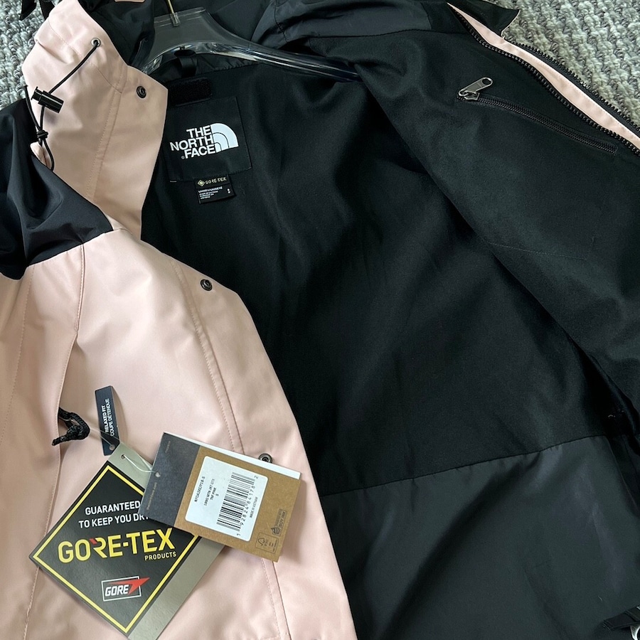 【THE NORTH FACE】マウンテンパーカー ピンク レディース メンズ 防水 防風 ジャケット ベビーピンク ブラック ユニセックス 登山 アウトドア ストリート