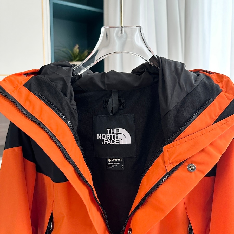 【THE NORTH FACE】マウンテンパーカー オレンジ レディース メンズ 防水 防風 ジャケット オレンジ ブラック ユニセックス 登山 アウトドア ストリート